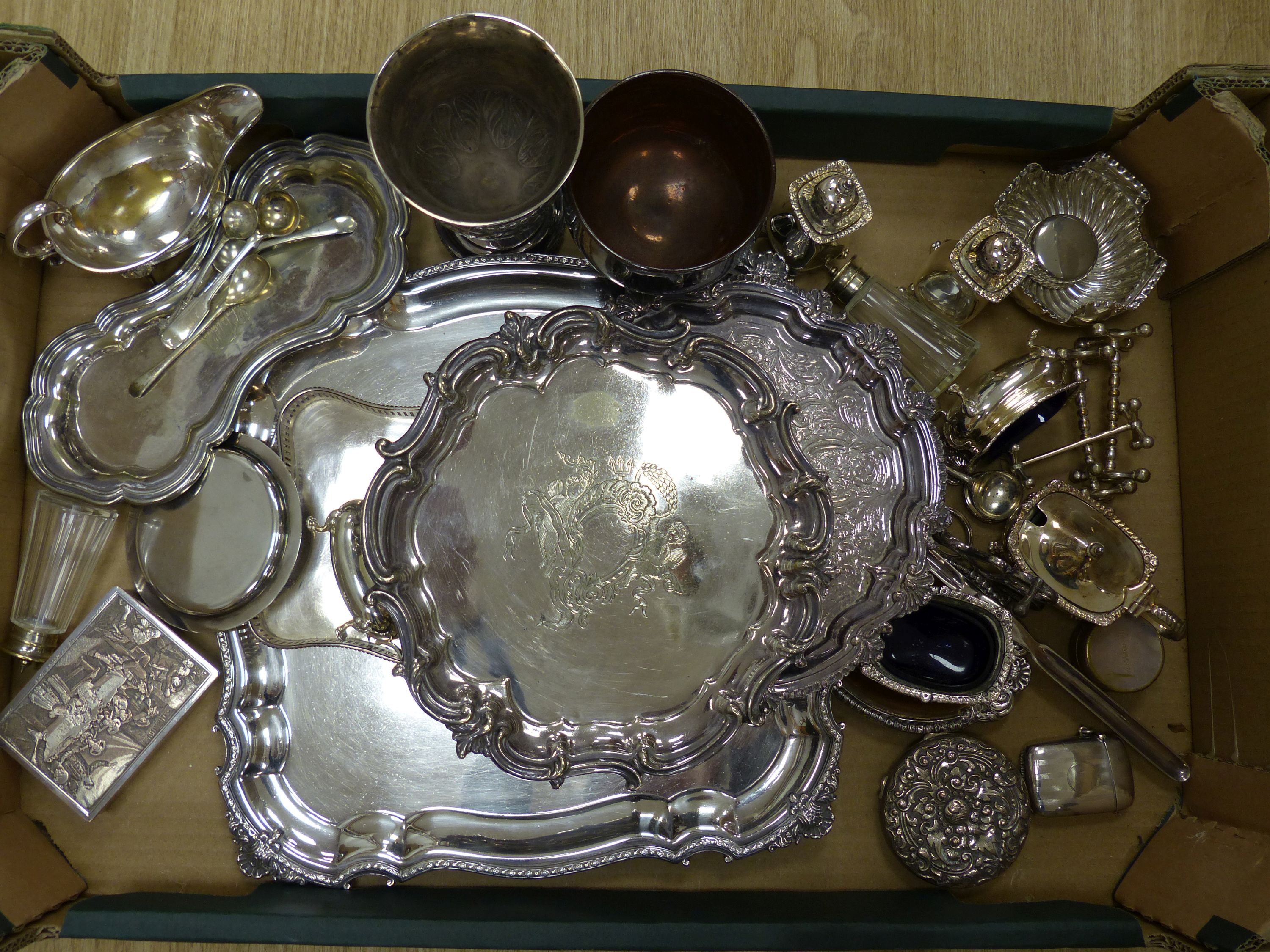 A quantity of silver plated wares including cruets, boxes, etc.